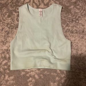 This is a light teal tank top from DSG